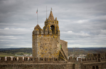 Fototapeta na wymiar Clock tower - castle of Montemor-O-Novo, District of Evora, Alentejo, Portugal