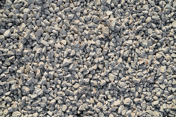 gravel on the ground. gravel texture. stone wall background