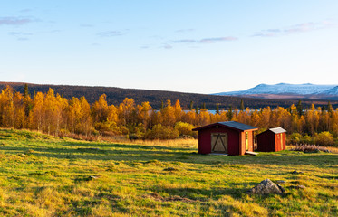 old barn in the mountains in autumn in sweden