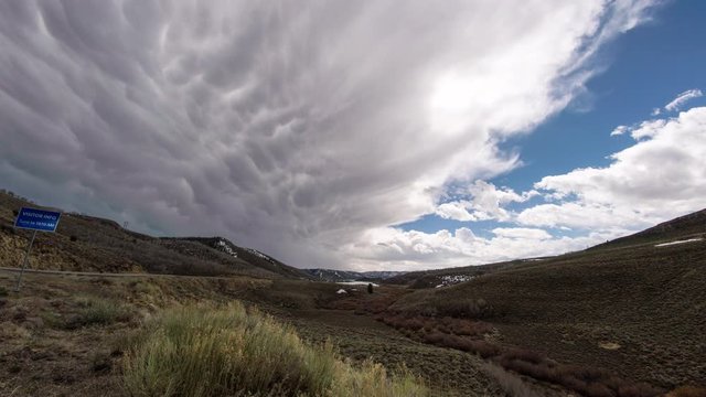 Time lapse of mammatus clouds following the end of a storm from super wide angle.
