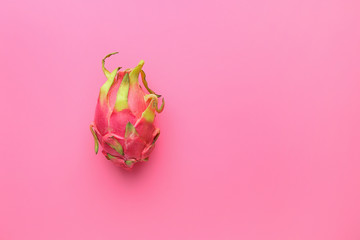 Tasty dragon fruit on color background