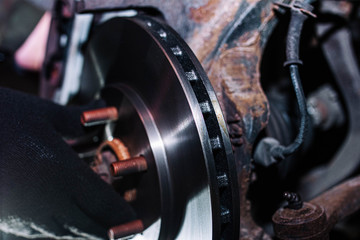Fototapeta premium replacement of ventilated car brake discs.