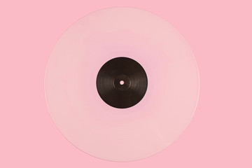 Pink vinyl disk on a pink background 