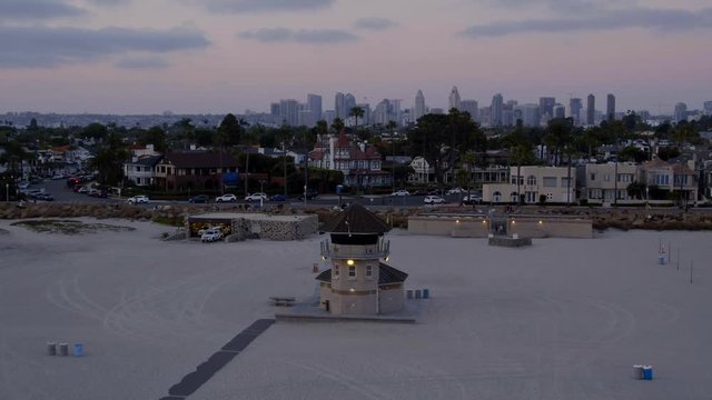 Aerial Drone footage of lifeguard towers and the empty Coronado Beach during the Covid and Coronavirus lockdown. San Diego, California, USA.