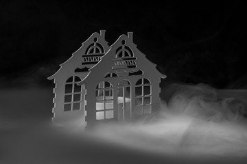 candlestick in smoke on a black background
