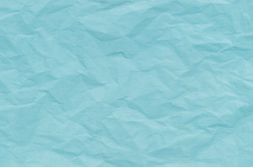 Wrinkled blue paper texture background