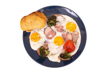 Traditional breakfast with bacon, fried eggs, tomato, broccoli and toast, isolated on white background, top view