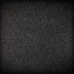 Dark grey black slate background or texture.