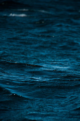 water texture. Vertical image of the shapes of the sea