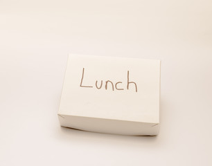 White cardboard take out food box isolated against white background.