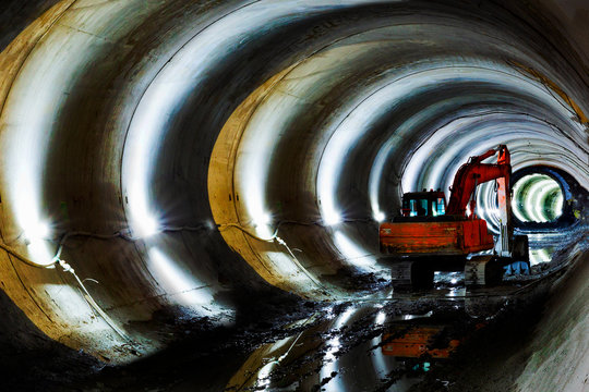 tunnel construction site and caterpillar
