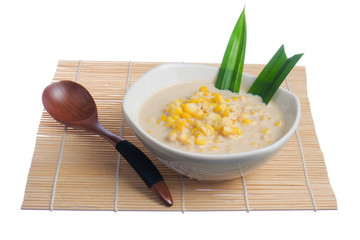 Corn porridge  in white bowl isolated on white background