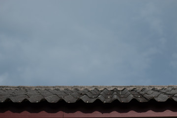 Photos of the roof of the house and the rain cloud.