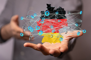 Abstract of germany map network in hand
