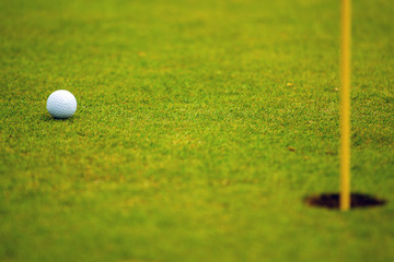 Player a during a golf game during a hit