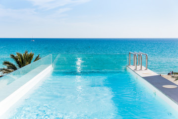 Fototapeta na wymiar Pool and sea landscape in Majorca