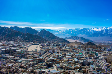 Leh City from Mountain top with himalayan mountain at back