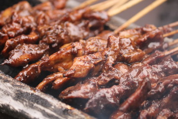 Satay (Indonesian: Sate) is a Indonesian dish of seasoned, skewered and grilled meat, served with a sauce.
