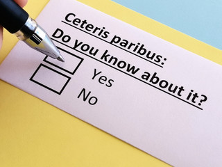 Obraz premium One person is answering quetion about ceteris paribus.