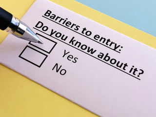 One person is answering quetion about barriers to entry.