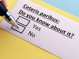 One person is answering quetion about ceteris paribus.