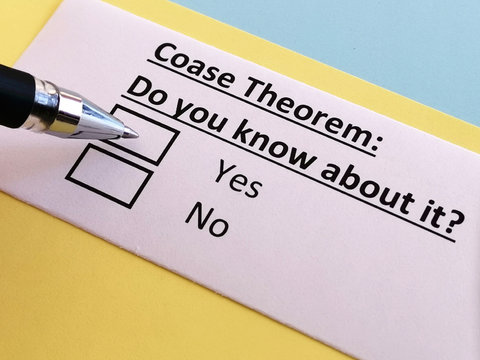 One person is answering quetion about coase theorem.