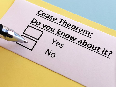One person is answering quetion about coase theorem.
