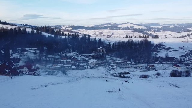 Aerial Shot | Gemba Mountains Ukraine | Ski & Snowboarding mountain in Ukraine | Snow & Winter Time in Ukraine Village of Gemba | Top of the Mountain | Sea of Clouds in Mountains.