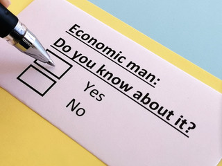 Obraz premium One person is answering quetion about economic man.