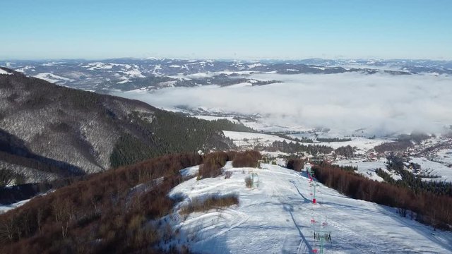Aerial Shot | Gemba Mountains Ukraine | Ski & Snowboarding mountain in Ukraine | Snow & Winter Time in Ukraine Village of Gemba | Top of the Mountain | Sea of Clouds in Mountains.