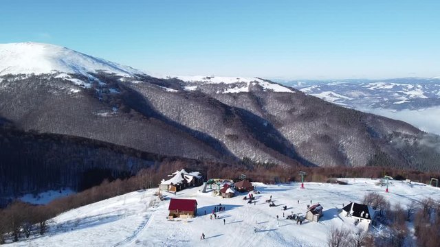 Aerial Shot | Gemba Mountains Ukraine | Ski & Snowboarding mountain in Ukraine | Snow & Winter Time in Ukraine Village of Gemba | Top of the Mountain | Sea of Clouds in Mountains.