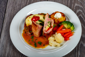 lunch or dinner with a plate of fish and vegetables and lemon and delicious sauces