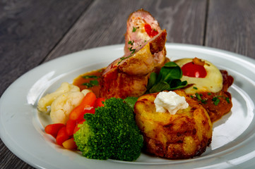 lunch or dinner with a plate of fish and vegetables and lemon and delicious sauces