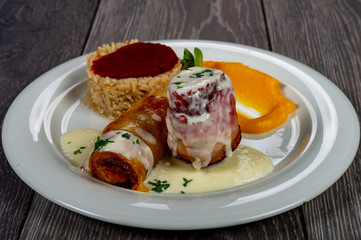 lunch with meat roll with vegetables and sauces and beets
