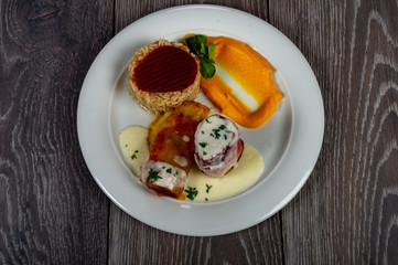 lunch with meat roll with vegetables and sauces and beets