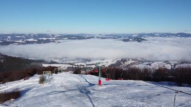 Aerial Shot | Gemba Mountains Ukraine | Ski & Snowboarding mountain in Ukraine | Snow & Winter Time in Ukraine Village of Gemba | Top of the Mountain | Sea of Clouds in Mountains.