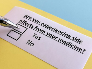 Fototapeta premium One person is answering question about medication side effect.