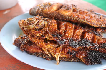 Ikan bakar are various kinds of popular Maritime Southeast Asian dishes, prepared with charcoal-grilled fish or other forms of seafood, notable in Indonesian and Malaysian cuisines.