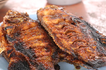 Ikan bakar are various kinds of popular Maritime Southeast Asian dishes, prepared with charcoal-grilled fish or other forms of seafood, notable in Indonesian and Malaysian cuisines.