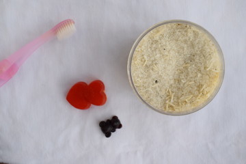 Toothbrush, bath salt, soap on a white background. The view from the top.