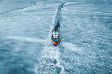 High angle view of ship moving through frozen Bothnian Sea