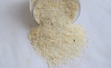 Bath salt, scattered on a white background. The view from the top.