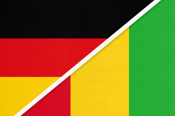Germany vs Guinea, symbol of two national flags. Relationship between European and African countries.