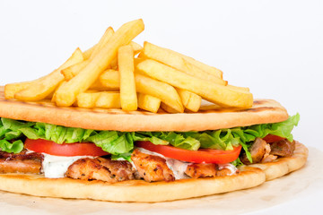 Combo set with french fries, meat, vegetables and sauce