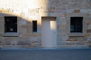 Facade of old historical building in Sydney With the vibrant sandstone colours During a sunny clear day