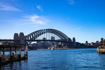 Naklejka premium Sydney Harbour Australia on a sunny clear blue sky day with the turquoise colours of the bay