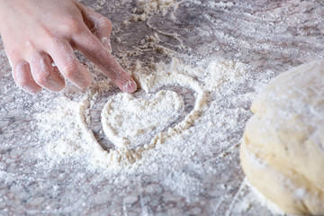 Girl making pizza dough