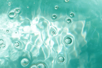 Ripple Water in swimming pool with sun reflection