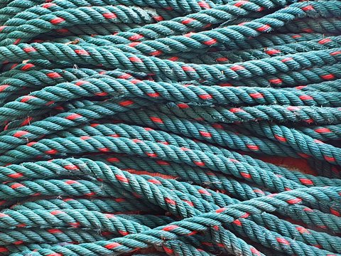Old green nylon rope background.