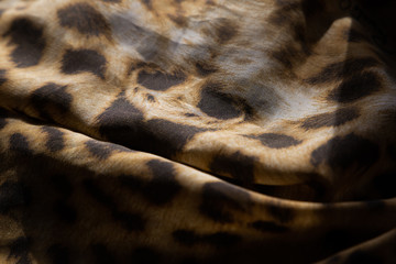 
folded cheetah scarf